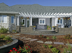 Retaining walls and pavers add curb appeal to your front entry